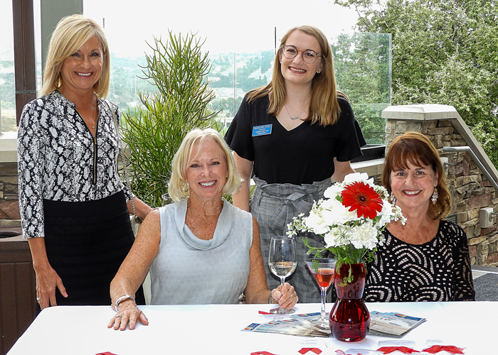 Tammy, Dianne, Maddy, and Nancy welcome guests to The Crossings.
