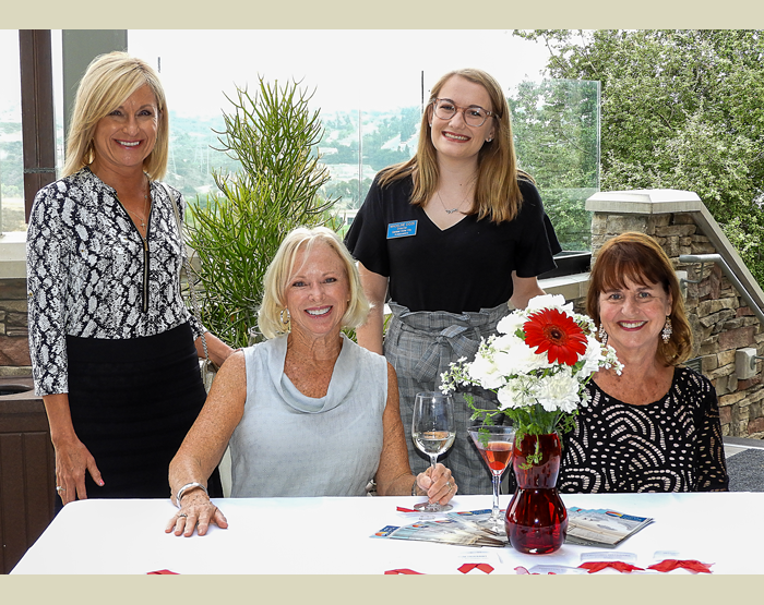 Tammy, Dianne, Maddy, and Nancy welcome guests to The Crossings.