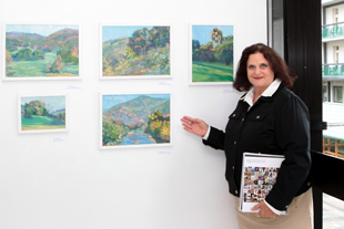Rita Shulak viewing her art submissions in Karlovy Vary